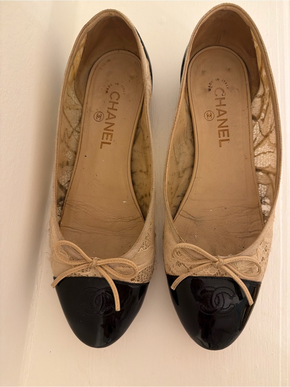 CHANEL Beige Lace Flats with Black Patent Cap Toe and Bow